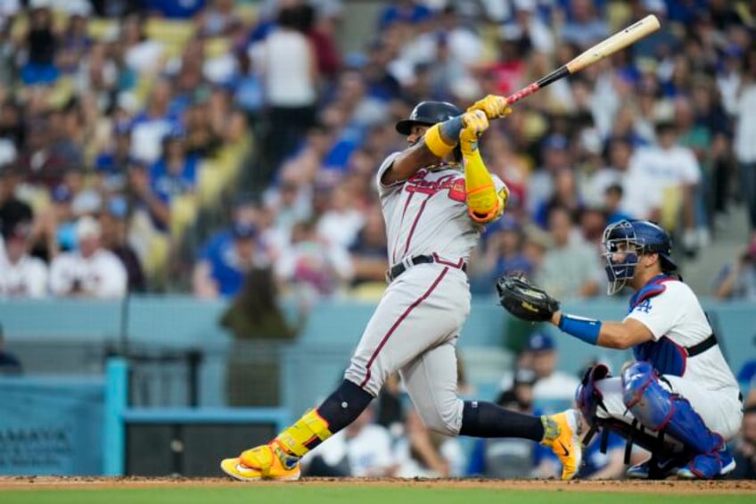 acuna homers in 3rd straight game against dodgers as braves win 4 2 in 10 for 6th in a row