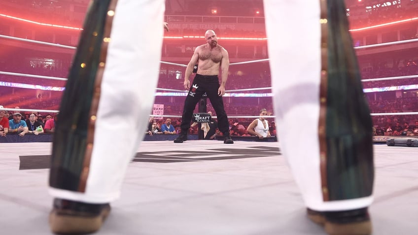 Jon Moxley stares down Adam Page