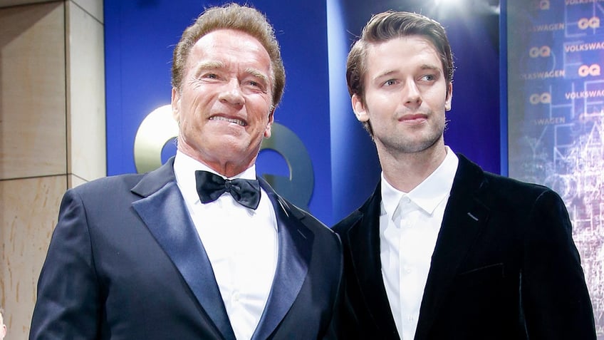 Arnold and Patrick Schwarzeneggar smiling together