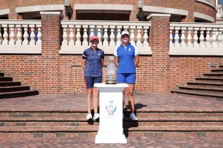 US Solheim Cup captain Stacy Lewis, at left with European captain Suzann Pettersen, shifte