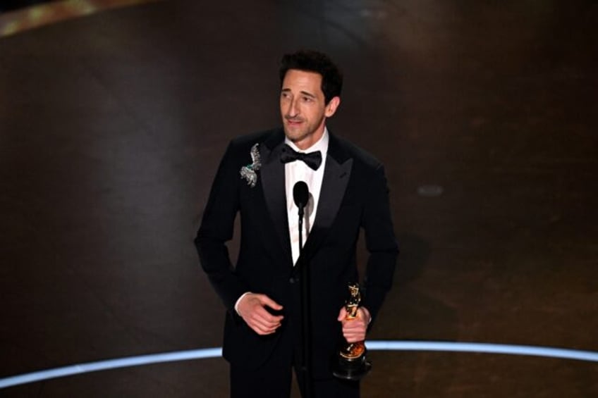 Adrien Brody accepts the best actor Oscar for 'The Brutalist'