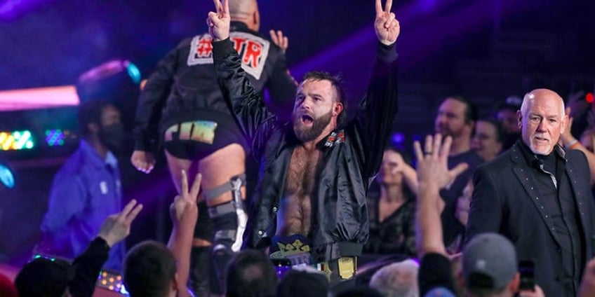 aew tag team champ cash wheeler arrested in florida for aggravated assault with firearm county records show