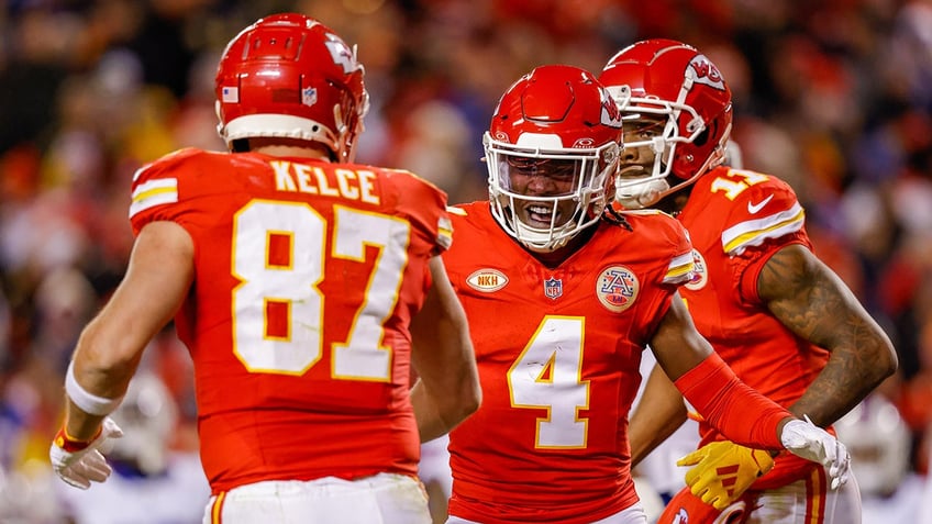 Rashee Rice celebrates with Kelce