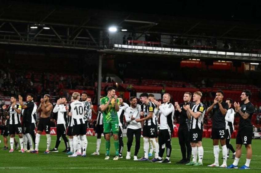 Shoot-out success: Newcastle celebrate their English League Cup second round-win over Nott