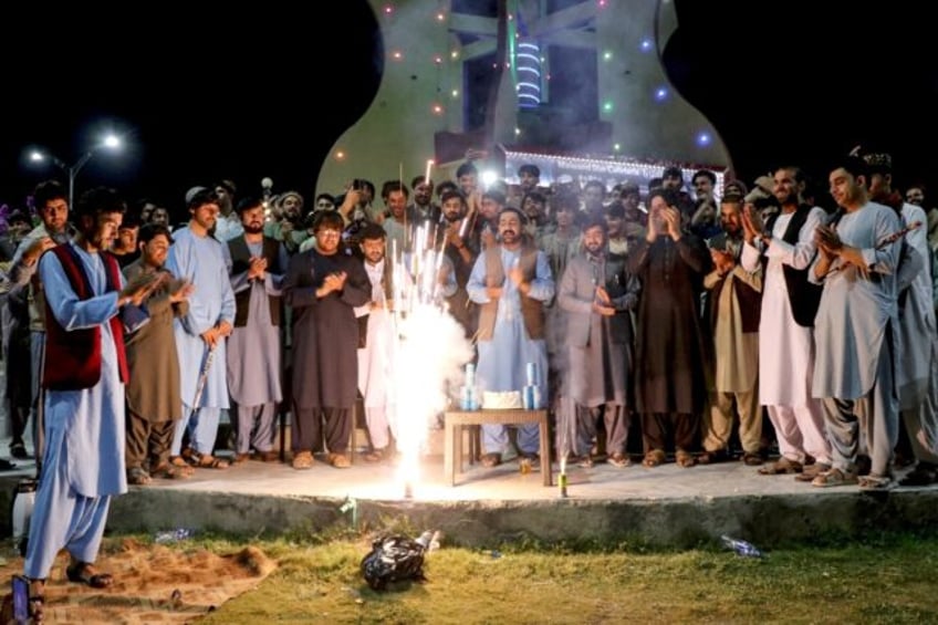 Afghan fans light firecrackers in Khost on June 23, 2024 to celebrate Afghanistan's win ag