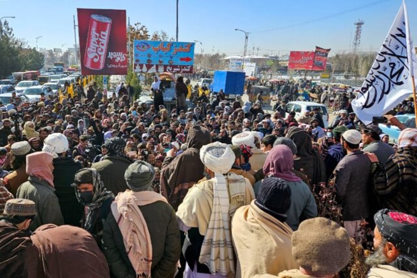 Taliban supporters gather at a rally in Ghazni in central Afghanistan to protest against m