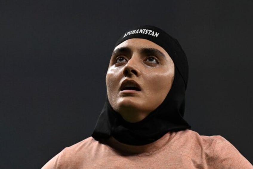 afghan woman sprinter sends message of defiance at asian games