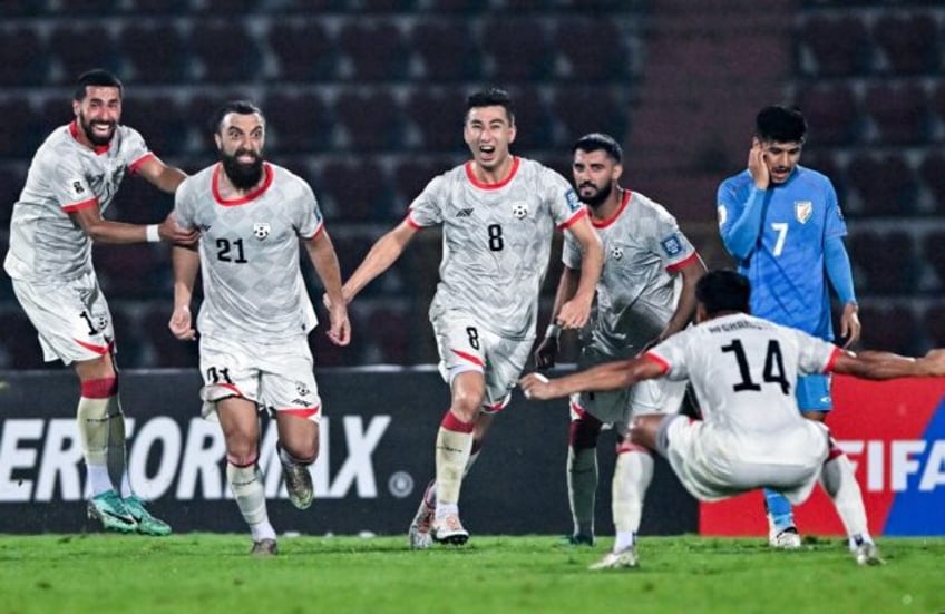 Afghanistan celebrate scoring against India earlier this year