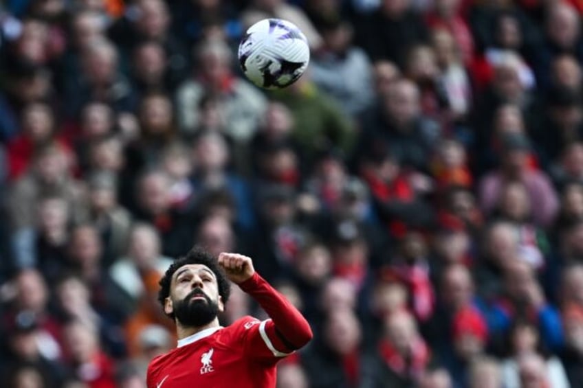 Liverpool star Mohamed Salah eyes the ball during a Premier League win over Brighton.