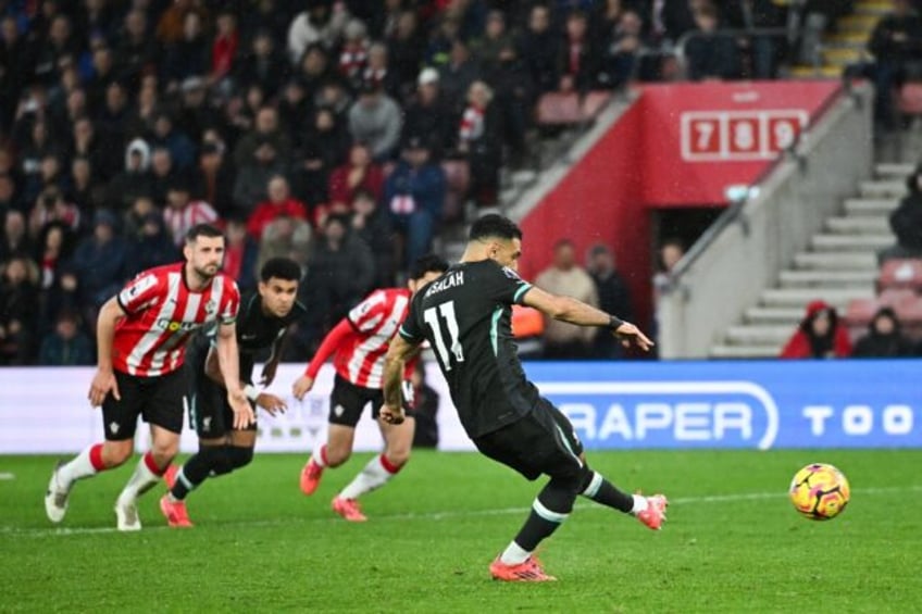 Mohamed Salah converts a penalty to give Liverpool victory at Southampton