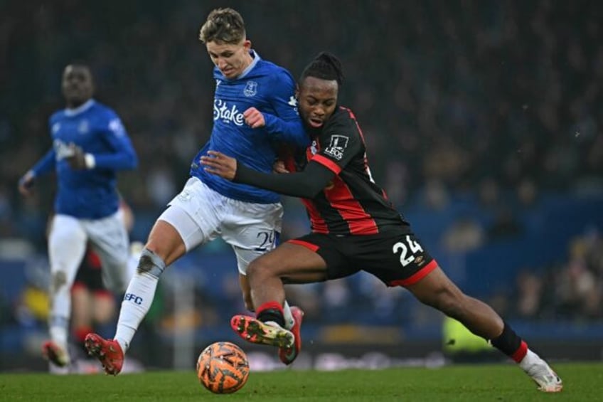 Bournemouth forward Antoine Semenyo (R) fights for the ball during an FA Cup tie at Everto