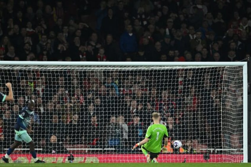 Yoane Wissa (L) equalises for Brentford against Arsenal