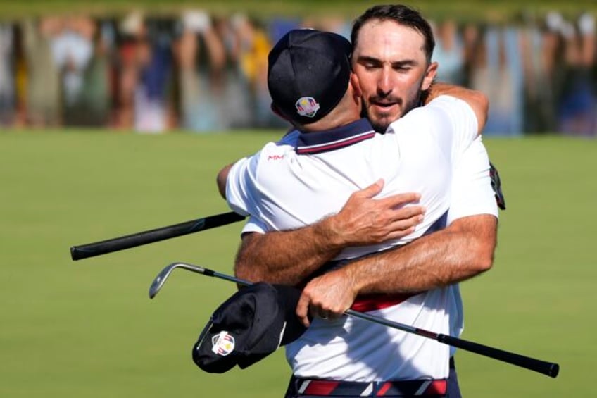 after 28 hours the us finally wins a full point at the ryder cup with rookies homa and harman