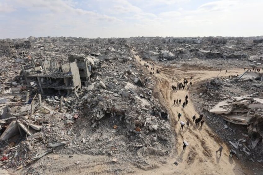 Displaced Gazans returned to the devastated Jabalia refugee camp on Sunday, just ahead of