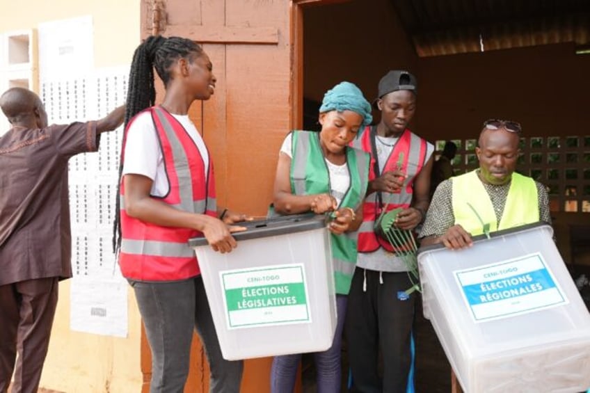 Electoral officials say Togo's ruling UNIR party won a huge majority in the parliament vot