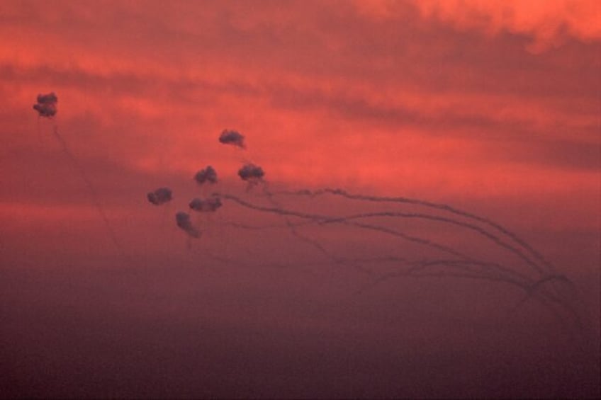 Israel's Iron Dome missile defence system intercepts a salvo of rockets fired from the southern Gaza Strip in December 2023