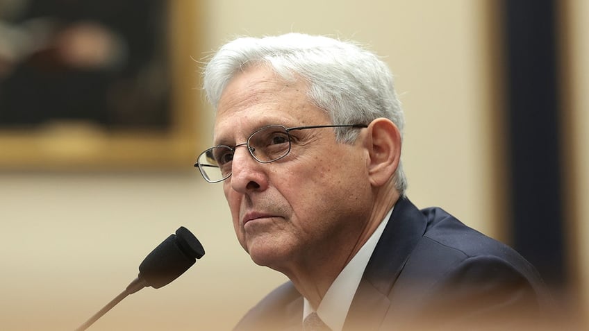 ag merrick garland claims in interview hed resign if biden asked him to take action against trump