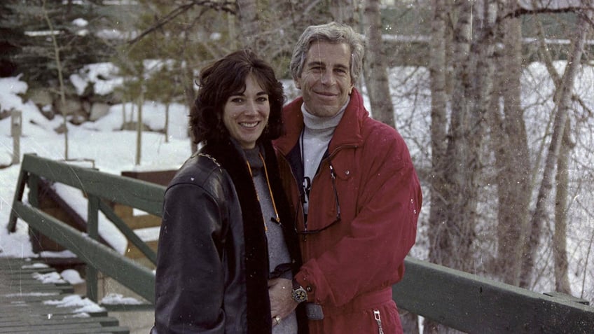 Ghislaine Maxwell and Jeffrey Epstein smile in this undated photograph