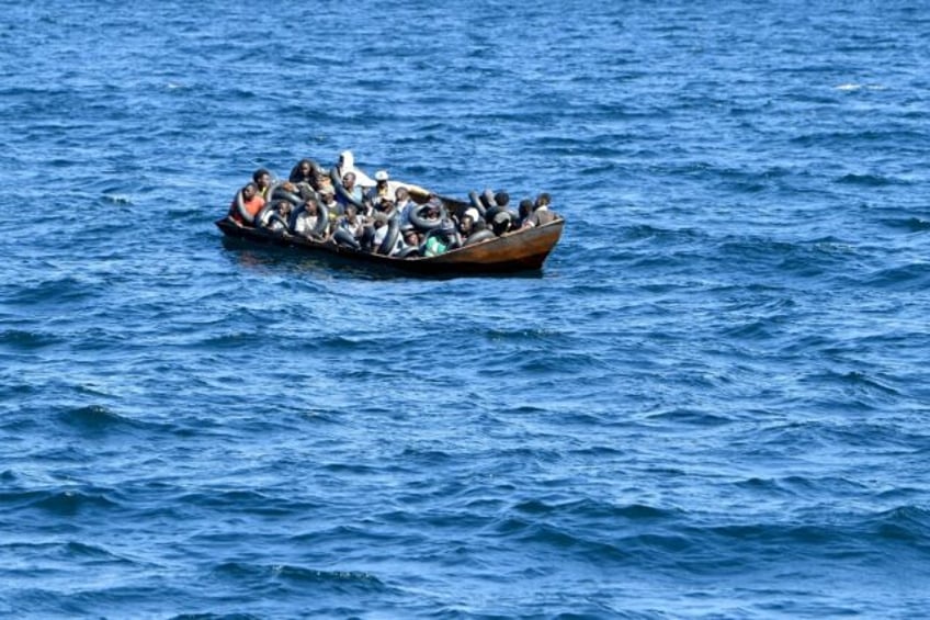 Migrants try to flee to Europe on board small boats like this one, intercepted by Tunisian