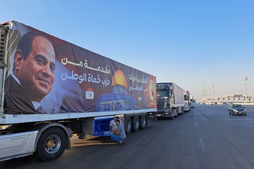 aid trucks wait at egypts border with war torn gaza after deal