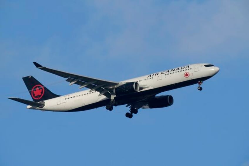 air canada apologizes for booting passengers who complained that their seats were smeared with vomit