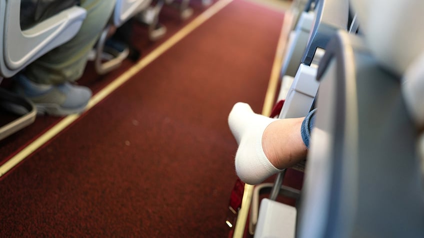 Feet on airplane