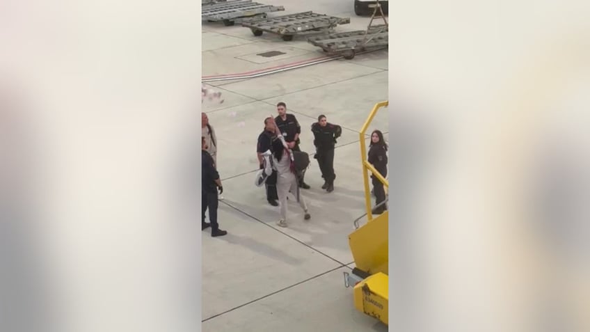 airplane drama including fierce argument between couple results in diverted flight police presence