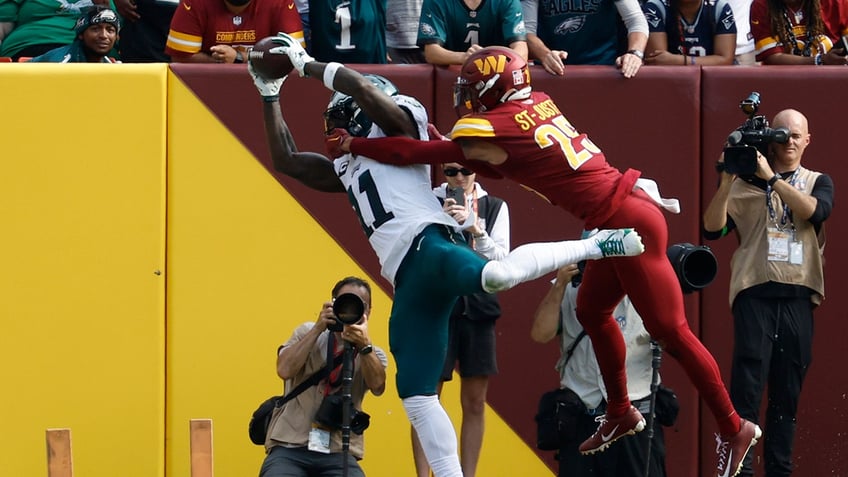 aj brown sets nfl record as eagles use second half surge to beat commanders