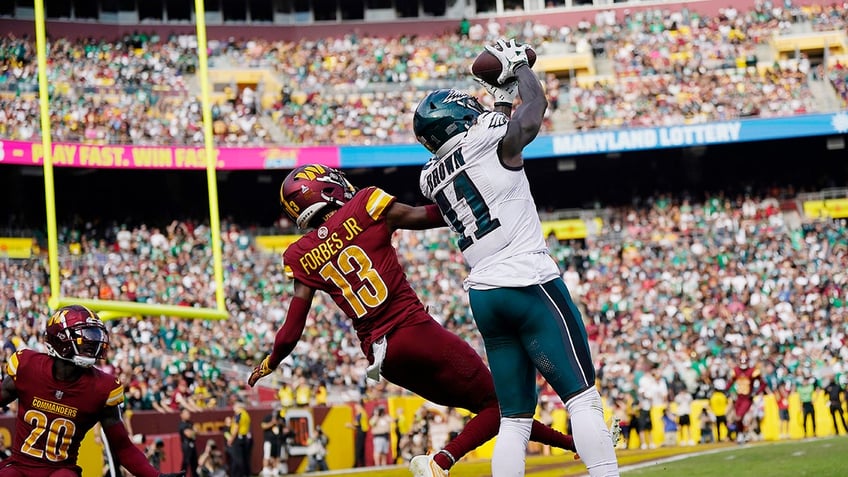 aj brown sets nfl record as eagles use second half surge to beat commanders