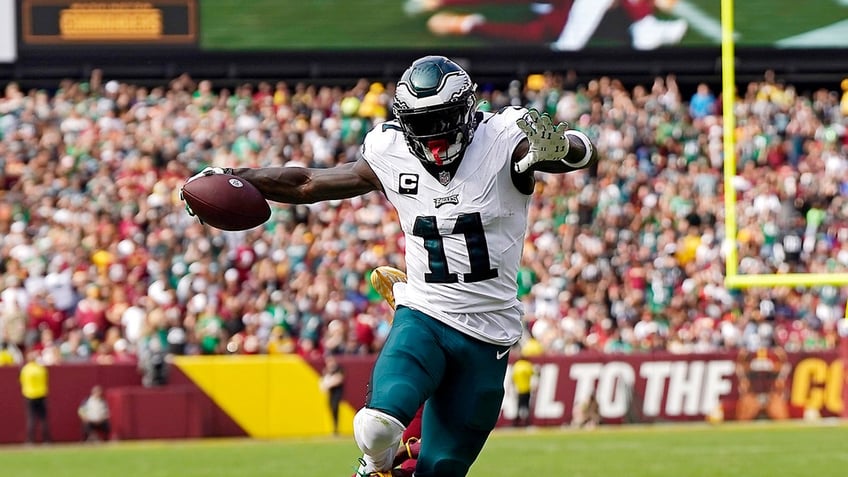 aj brown sets nfl record as eagles use second half surge to beat commanders