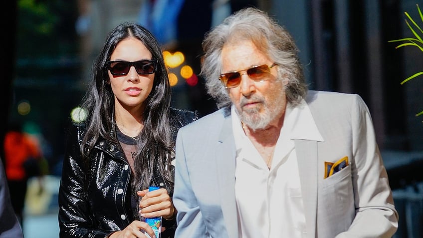 A photo of Noor Alfallah and Al Pacino