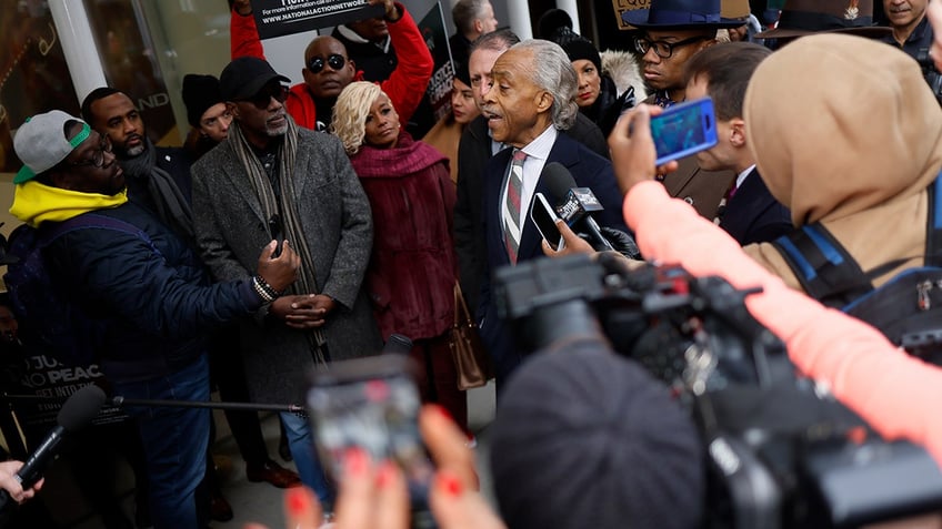 Al Sharpton speaking to the media