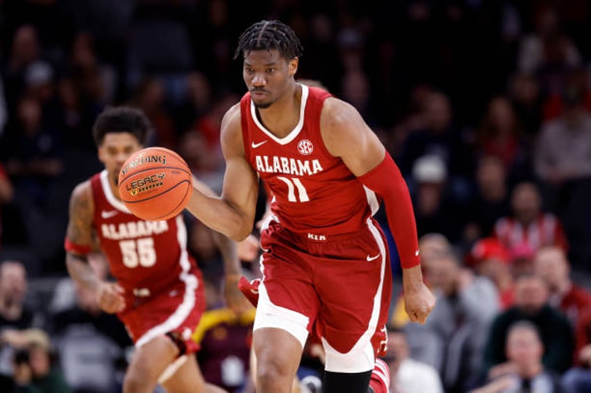 Mohamed Wague of the Alabama Crimson Tide controls the ball during the second half of the Jerry Colangelo's 2023 Hall of Fame Series Phoenix game...