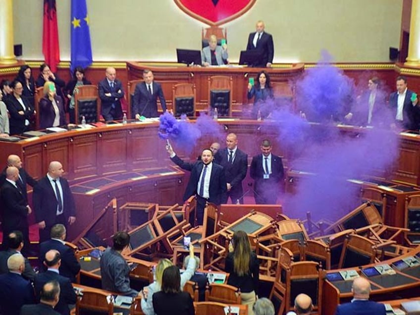 albanian opposition lawmakers disrupt session with firecrackers to protest socialist rule