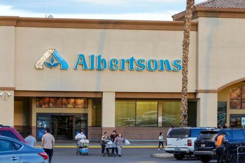 albertsons says it is ending merger agreement with kroger