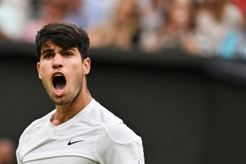 Carlos Alcaraz battled back to beat Frances Tiafoe in the Wimbledon third round