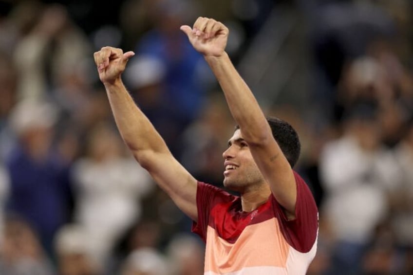 Spain's Carlos Alcaraz celebrates his fourth-round victory over Grigor Dimitrov at Indian
