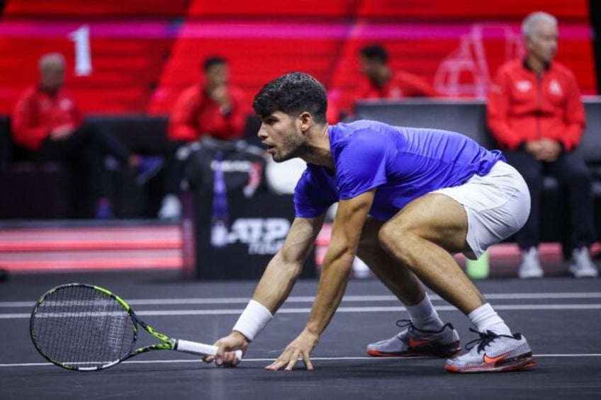 Low point: Carlos Alcaraz on his way to defeat in the doubles at the Laver Cup on Friday