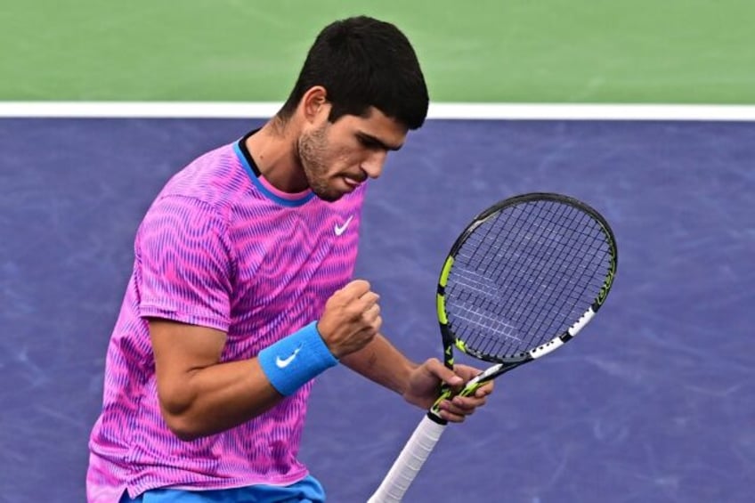 Spain's Carlos Alcaraz celebrates a point in his semi-final victory over Italian Jannik Si