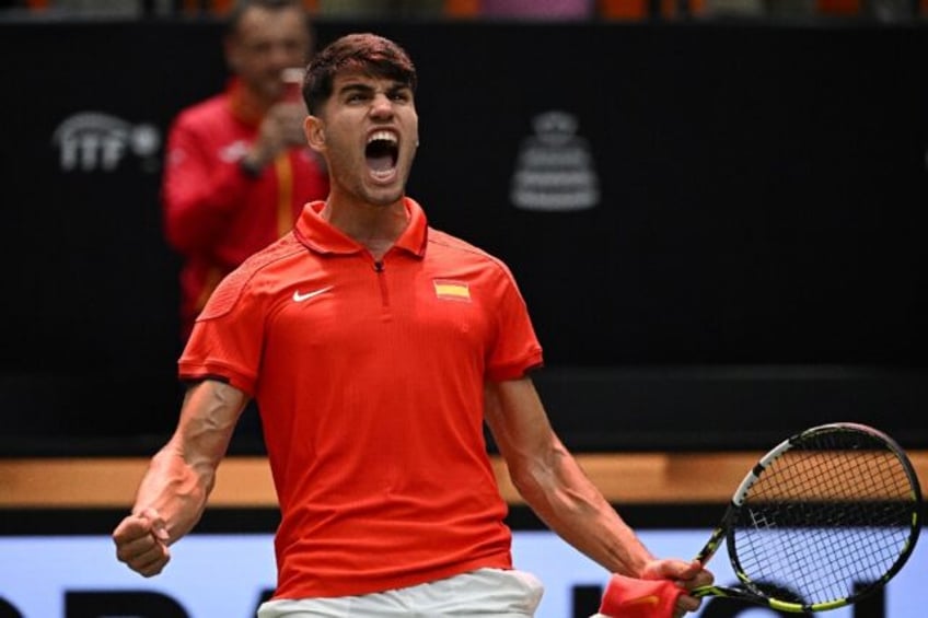 Spain's Carlos Alcaraz celebrates after winning against France's Ugo Humbert