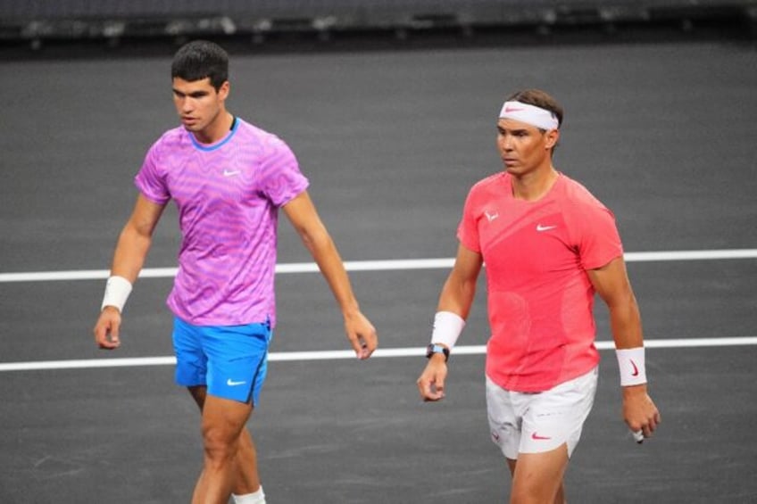 Spanish superstars Carlos Alcaraz and Rafael Nadal in action during The Netflix Slam tenni