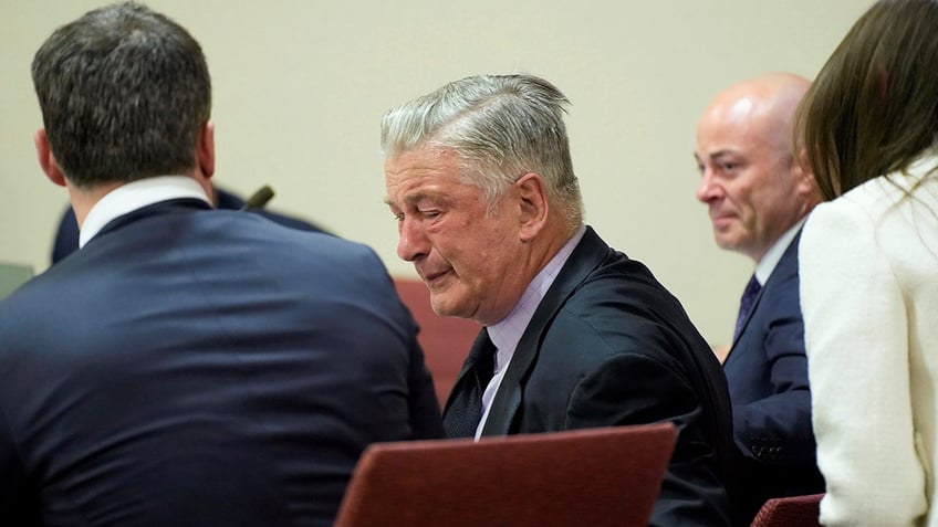 Alec Baldwin reacts during his trial for involuntary manslaughter