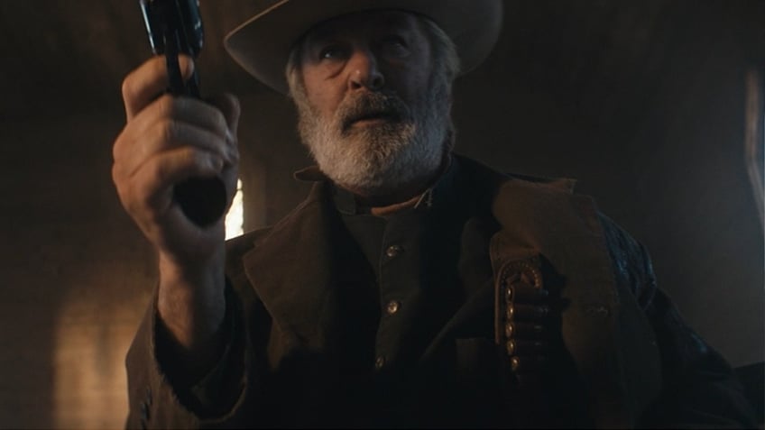 Alec Baldwin appears on video rehearsing with an Old West-style revolver