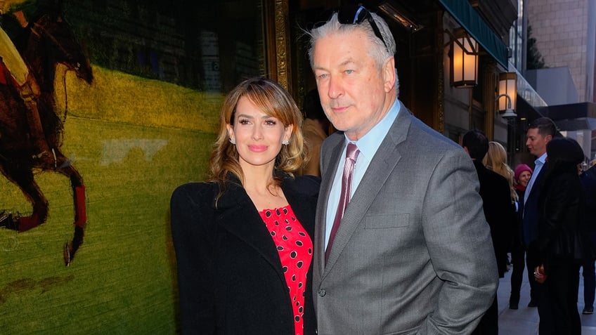 Hilaria Baldwin and Alec Baldwin pose for a photo in NYC