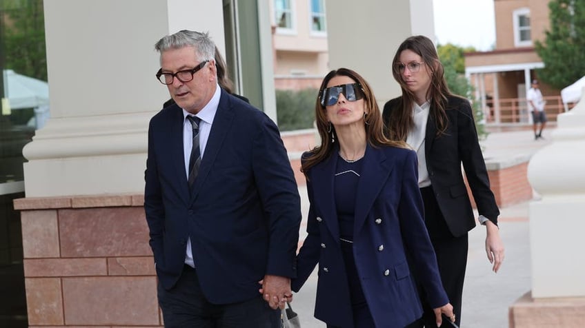 Alec and Hilaria Baldwin, exits the First Judicial District Court in Santa Fe, New Mexico on Thursday, July 11, 2024. Witness testimony for Alec Baldwin's involuntary manslaughter continued today for the fatal shooting of "Rust" cinematographer Halyna Hutchins.