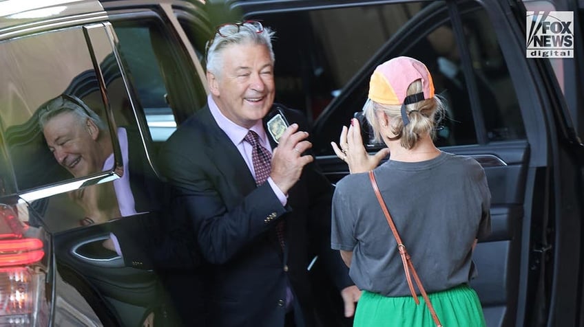 Alec Baldwin leaves his hotel in Sante Fe