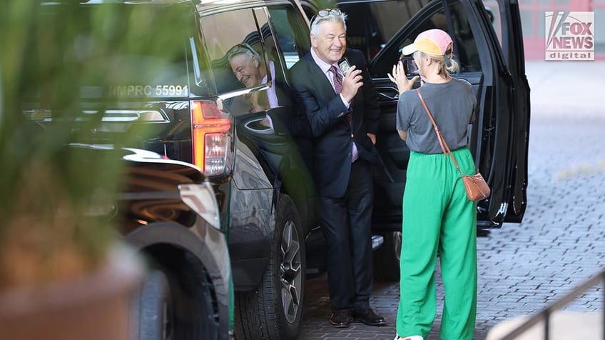 Alec Baldwin leaves his hotel in Sante Fe