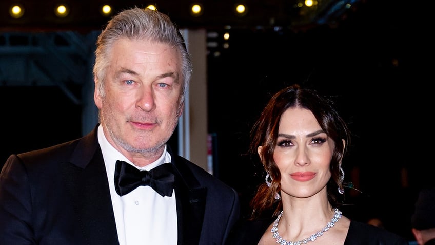 Alec Baldwin in a tuxedo and Hilaria Baldwin in a gown