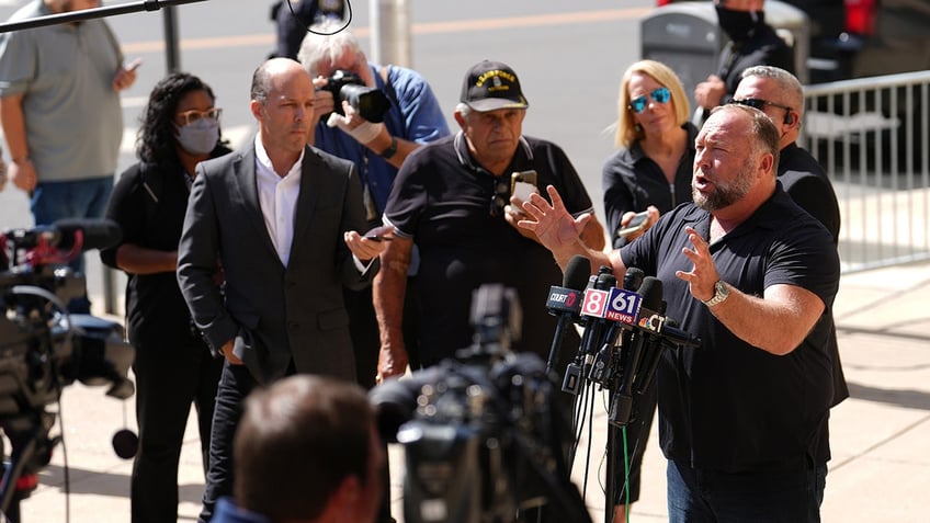 Alex Jones speaks with media outside Sandy Hook trial