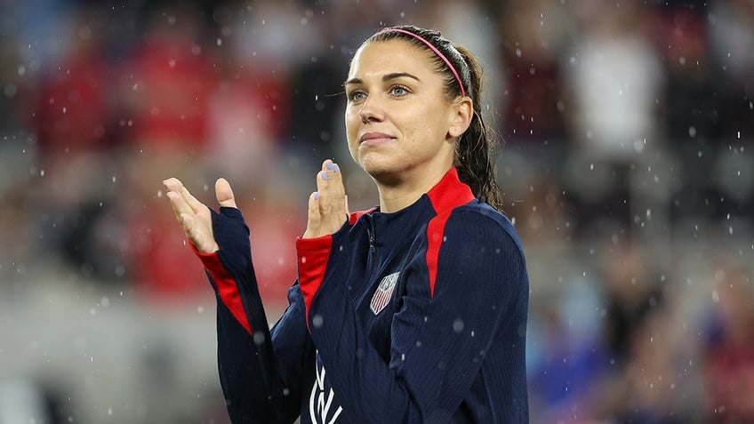 Alex Morgan reacts during a soccer game